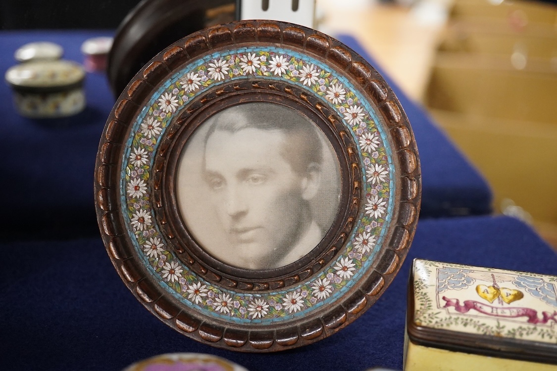 A collection of various 18th century and later trinket/pill boxes, a micro mosaic frame and two small carvings to include a tiger’s eye Scottie dog, frame 10cm in diameter